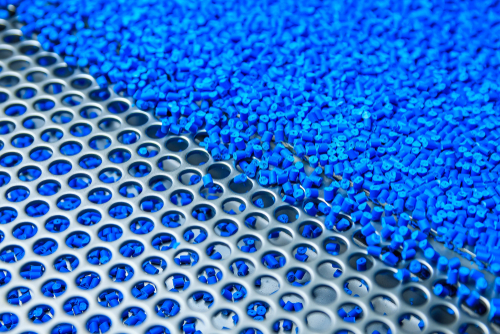 An image of plastic pellets to be used in injection molding